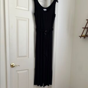 Elegant Black Sleeveless One Piece Belted outfit.